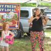 Denya Levine playing at Market with a young friend.
